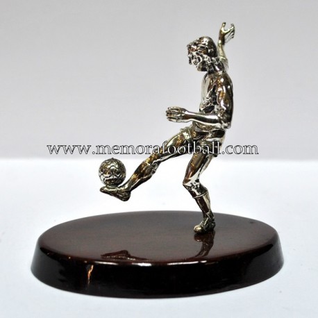 A silver figure of a footballer. Spain 1990s 