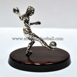 A silver figure of a footballer. Spain 1990s 